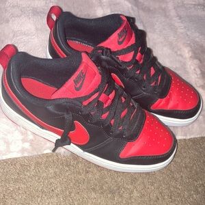 Red and black nikes